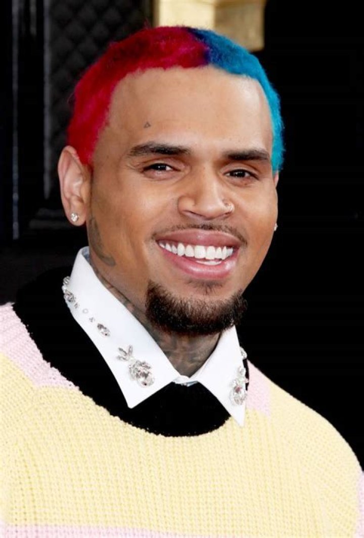 50 Cent Makes Fun Of Chris Brown’s Colorful Hair And Asks Him For A Collab In The Same Post!
