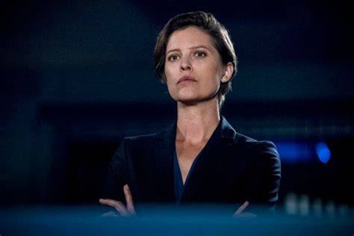 Arrow’s Audrey Marie Anderson Suits Up As Harbinger In New Crisis Photo