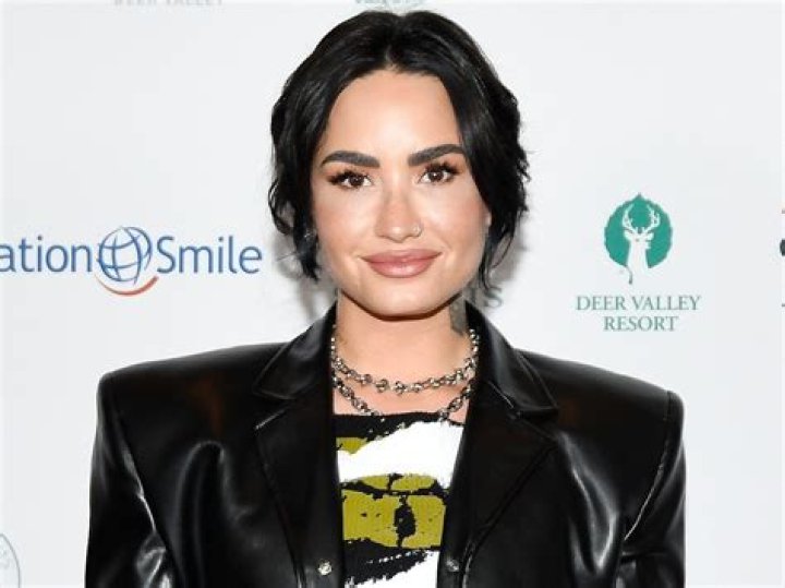 Demi Lovato Just Shared Rare Swimsuit Photo for "Summa Time" — Celebwell