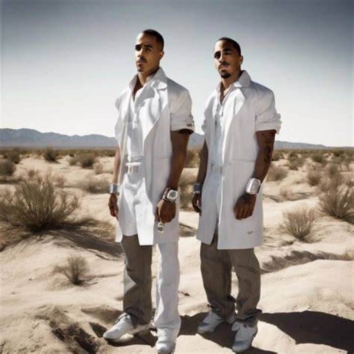 Does Marques Houston have a twin brother?