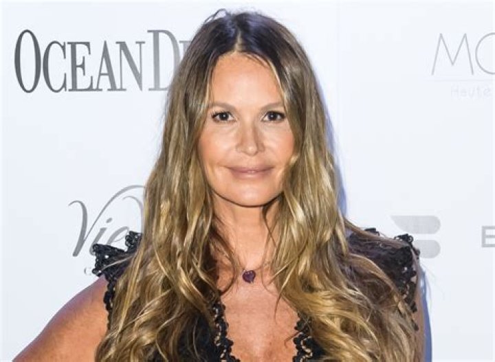 Elle Macpherson in Bathing Suit is "Floating on By" — Celebwell