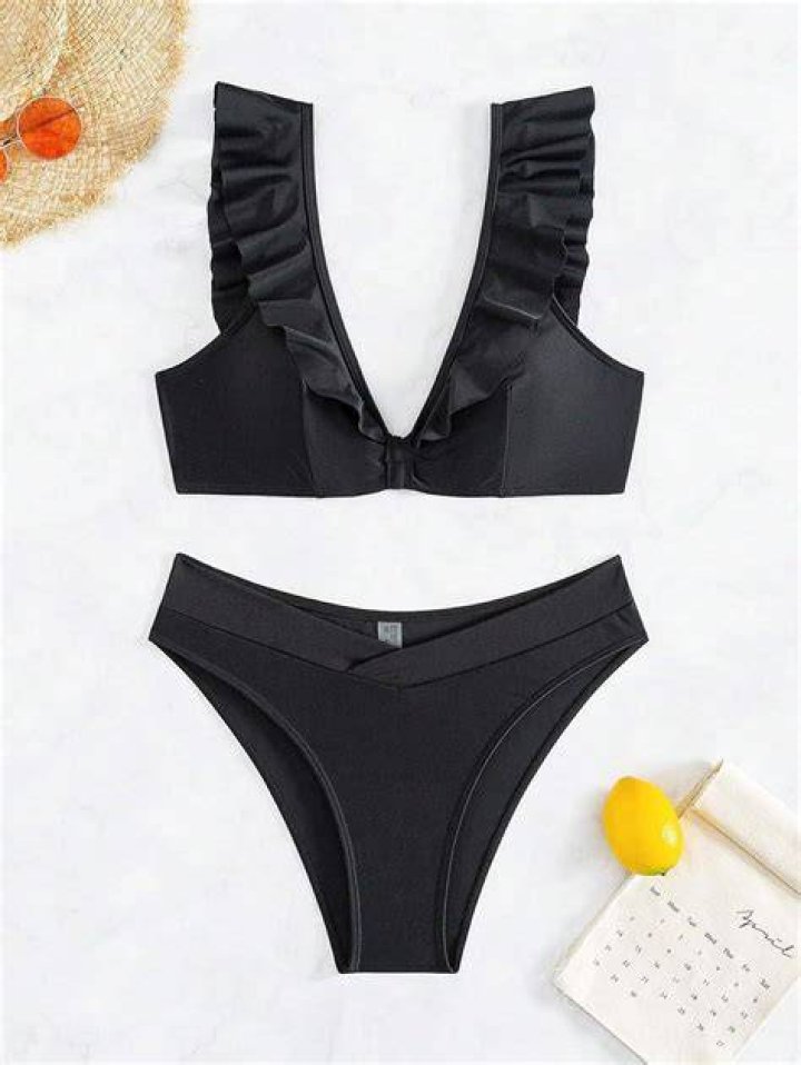 Emily Ratajkowski Flaunts Her Perfect Beach Body In Black Two Piece Bathing Suit