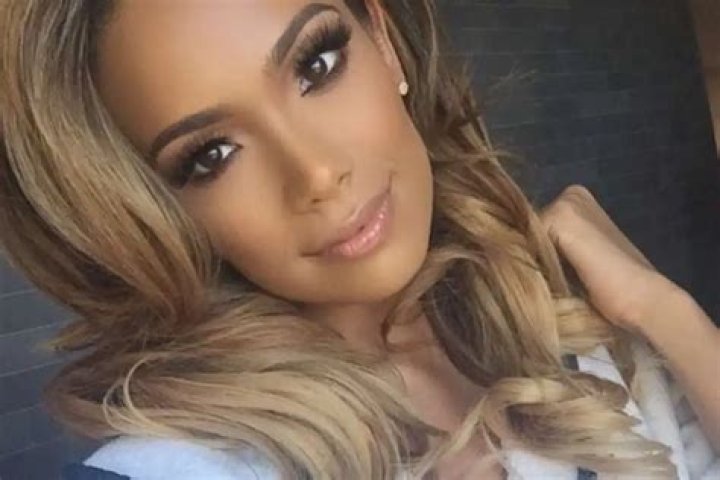 Erica Mena Breaks The Internet In A Skimpy Golden Swimsuit By The Pool – Check Out The Thirst Traps 7 Months Postpartum