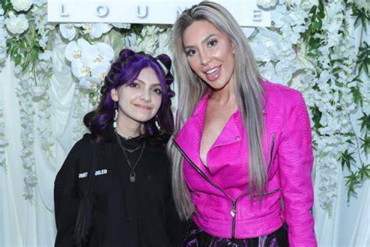 Farrah Abraham And Daughter Sophia Go Out In Colorful Matching Outfits With Their Equally Colorful Purple Dog!