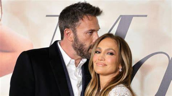 Jennifer Lopez Finally Reveals Who That Mystery Man In The Background Of Her Gym Selfie Was!