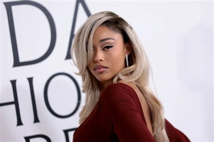 Jordyn Woods Is Glowing In Her Latest Photo – Check Her Out Driving This Red Beauty