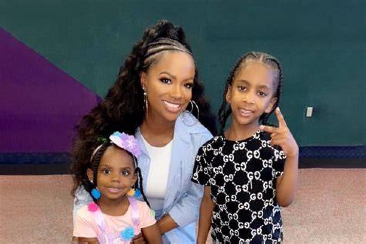 Kandi Burruss Wears Figure-Hugging Red Dress In TikTok Video With Her Daughter Blaze In Her Arms!
