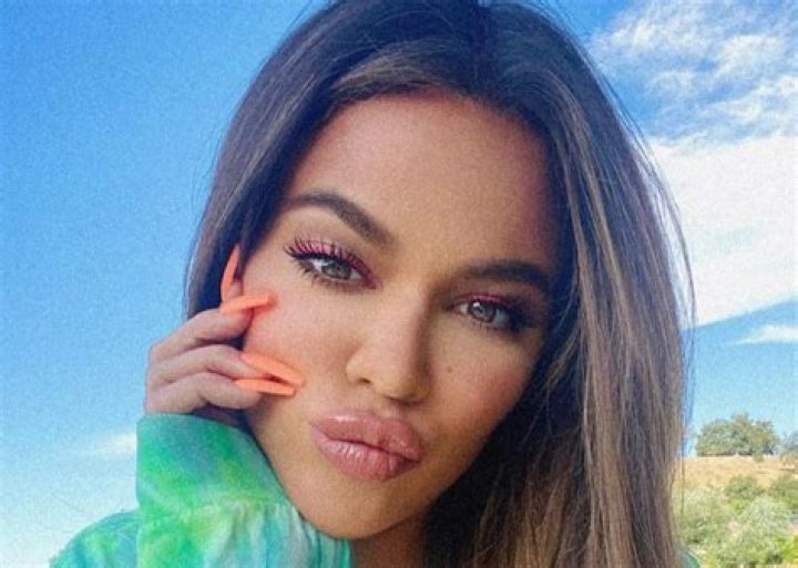 Khloe Kardashian And True Thompson Twin In Burberry Bathing Suits — Is She Hiding A Baby Bump?