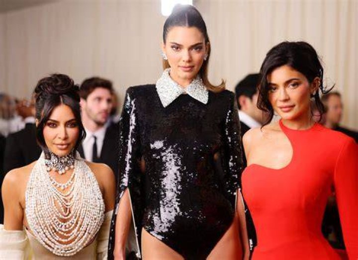 Kim Kardashian, Kourtney Kardashian And Kylie Jenner Are A Triple Threat In Orange Mini Skirts