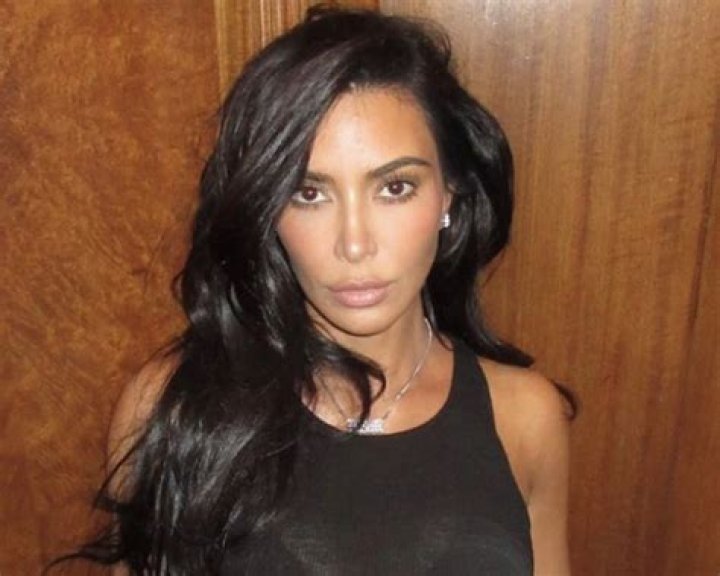 Kim Kardashian Shares Swimsuit Photo of "Self-Reflection" — Celebwell