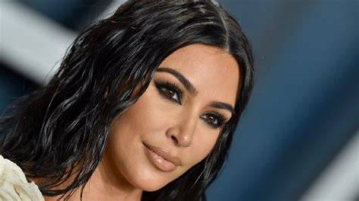 Kim Kardashian Shares Swimsuit Photo Saying "Risk and You Shall Receive" — Celebwell