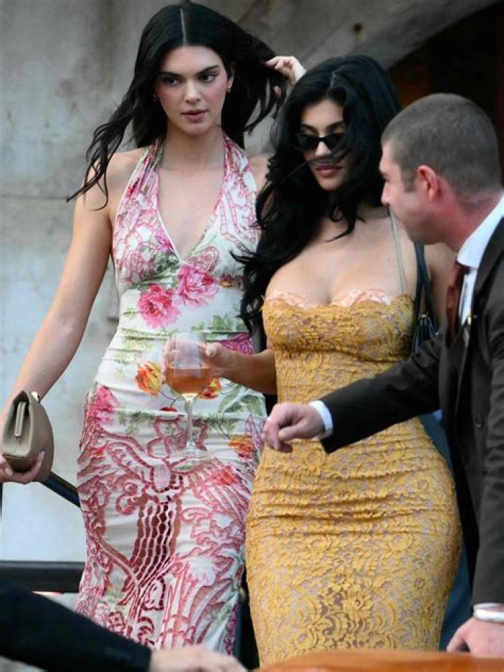 Kylie Jenner Wears Another Banana-Yellow Wig And Pairs It With A Flesh-Colored Fishnet Catsuit