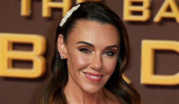 Michelle Heaton in Orange Workout Gear Supports Charity Burpee Challenge 