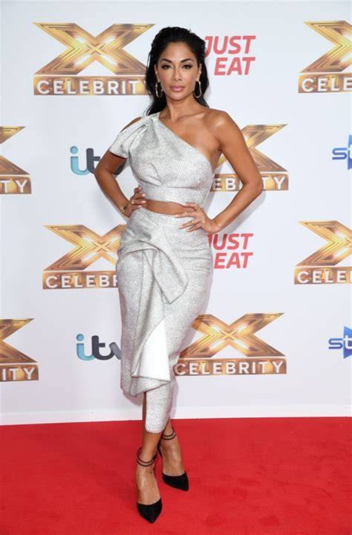 Nicole Scherzinger in Bathing Suit "Ignites the Warrior"  — Celebwell