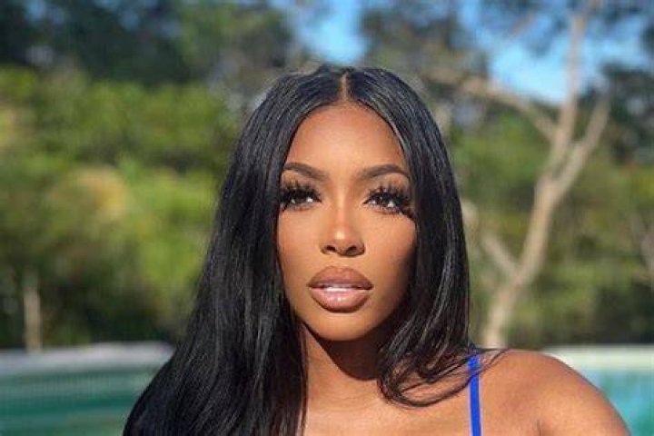 Porsha Williams Flaunts Her Beach Body In This Neon Green Swimsuit