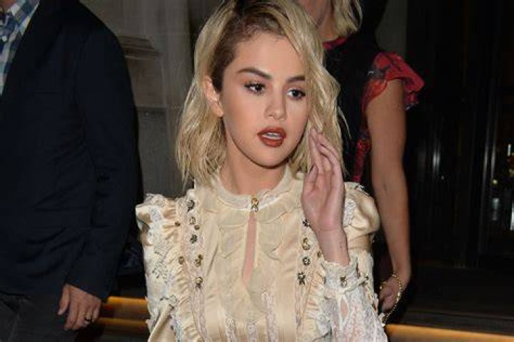 Selena Gomez ‘walked’ a short dress-jacket with lace
