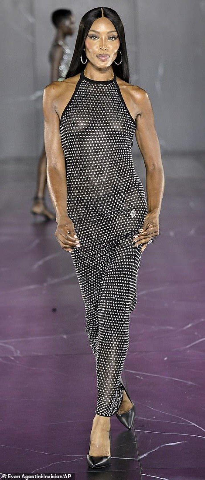 The paparazzi secretly filmed Naomi Campbell in a swimsuit