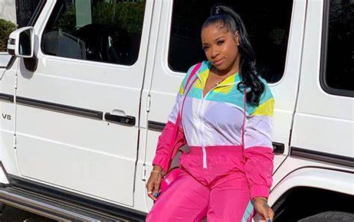Toya Wright Looks Drop Dead Gorgeous In A Body-Hugging Pink Dress While Attending A Wedding – Fans Are Guessing Toya Might Be Pregnant