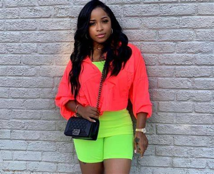 Toya Wright Tries To Look Amazing In Neon Bathing Suit Picture, But Lil Wayne’s Ex’s Feet Irk Fans