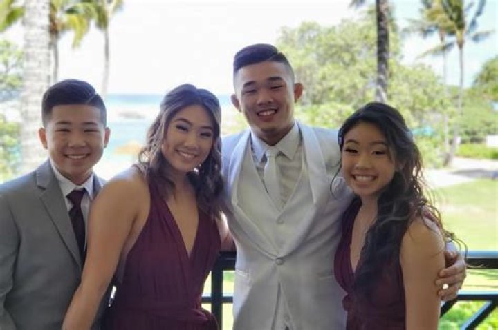 Who are Angela Lee brothers Christian Lee and Adrian Lee?