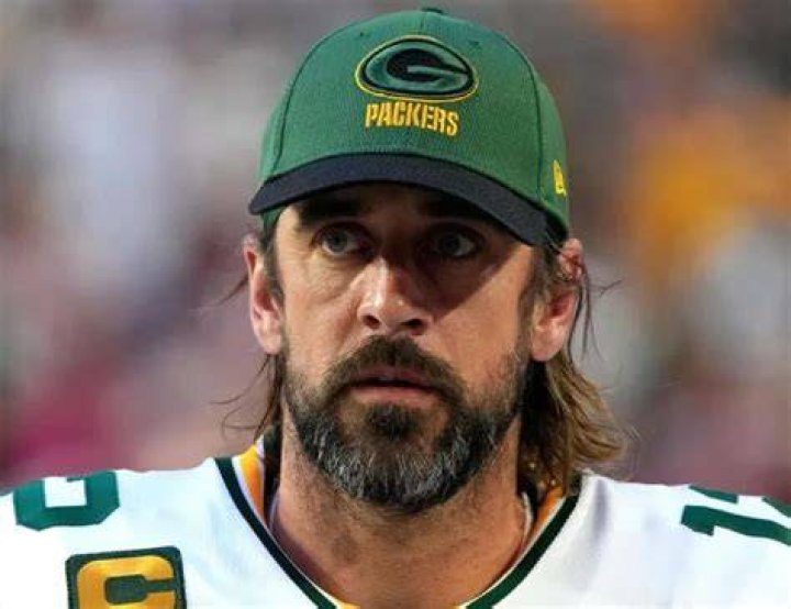 Why is Aaron Rodgers growing his hair long?